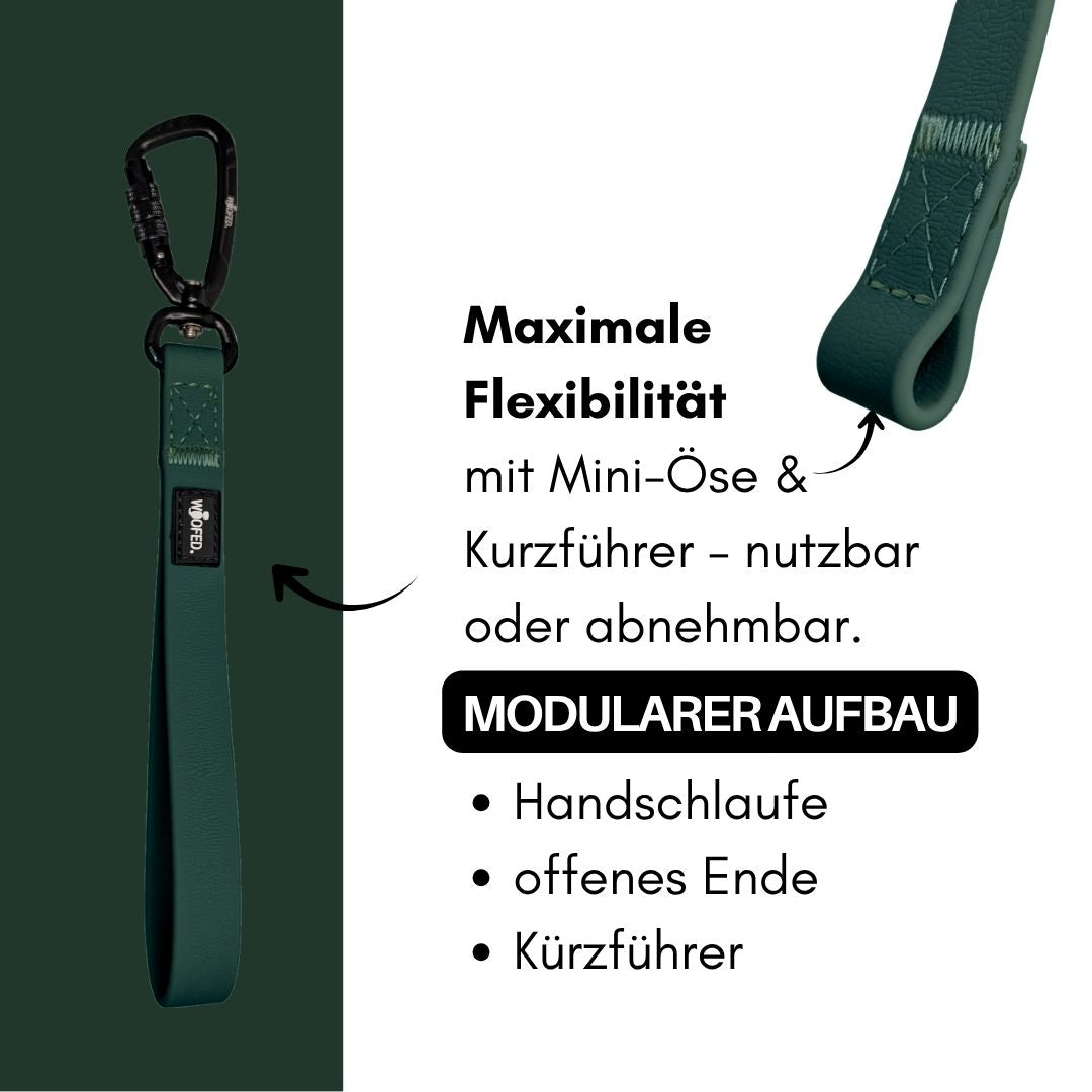 Nahaufnahme einer dunkelgrünen Schleppleine (Hunting Green) mit Handschlaufe, Mini-Öse und schwarzem Karabiner