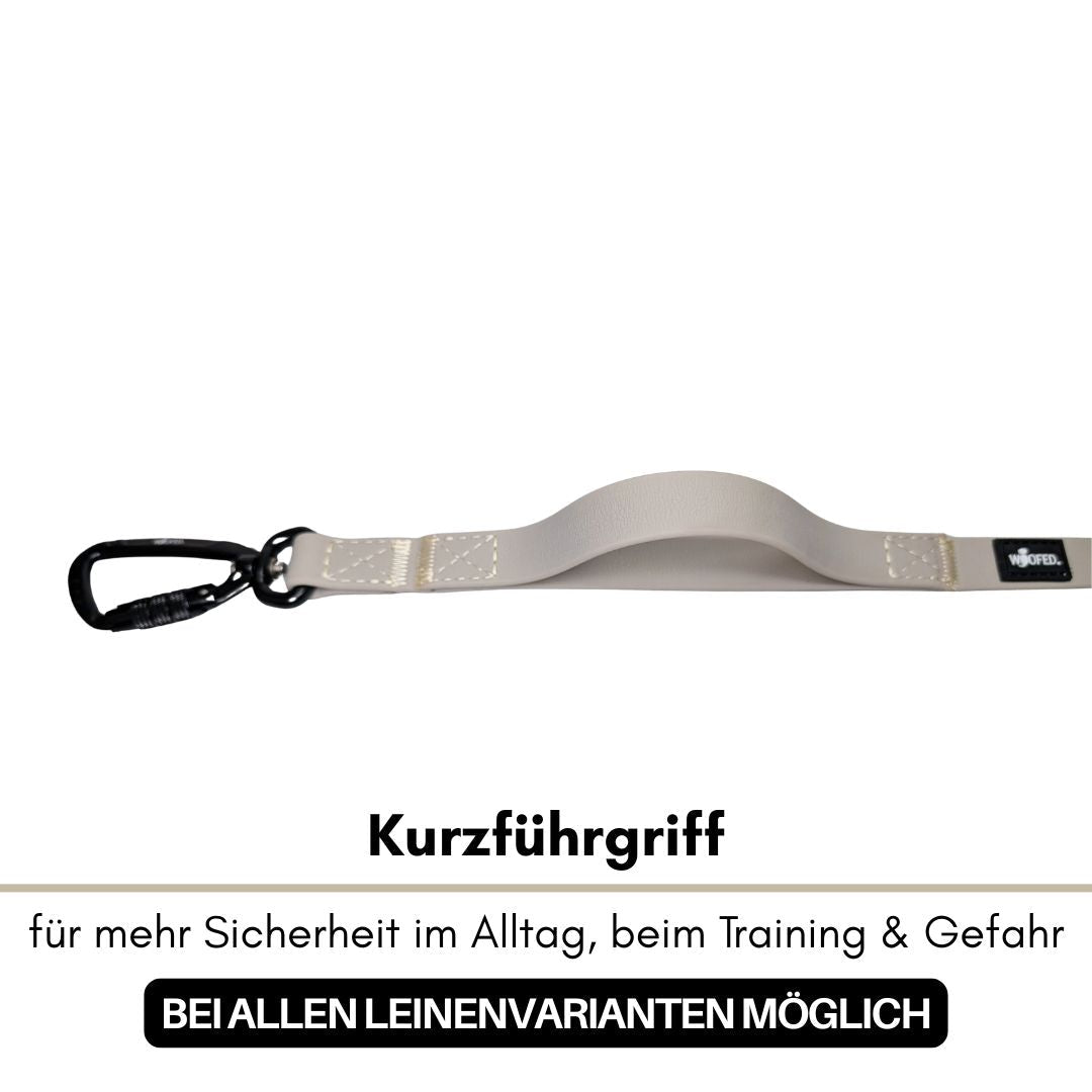 Kurzführgriff Desert-Sand: hellbeige Griff mit schwarzem Karabiner, sichtbare Nähte, Draufsicht