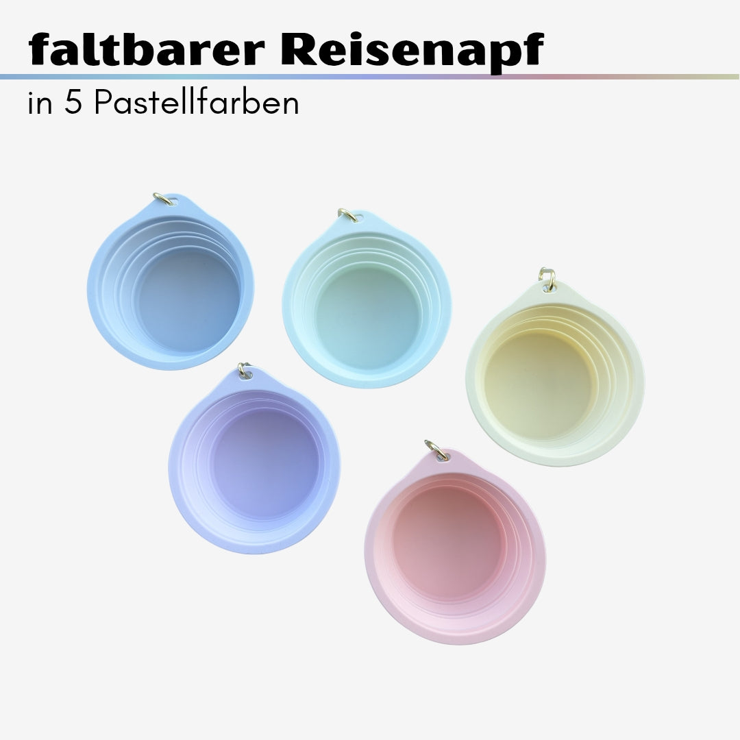 Draufsicht: fünf runde faltbare Reisenäpfe in Pastellblau, Mint, Gelb, Lila und Rosa mit Metallring