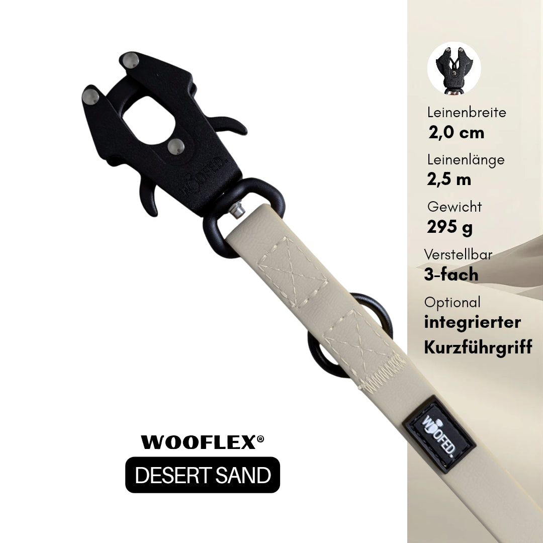 Nahaufnahme Führleine Desert Sand mit schwarzem Froschkarabiner, schwarzen Ringen, Ziernaht und WOOFLEX-Label